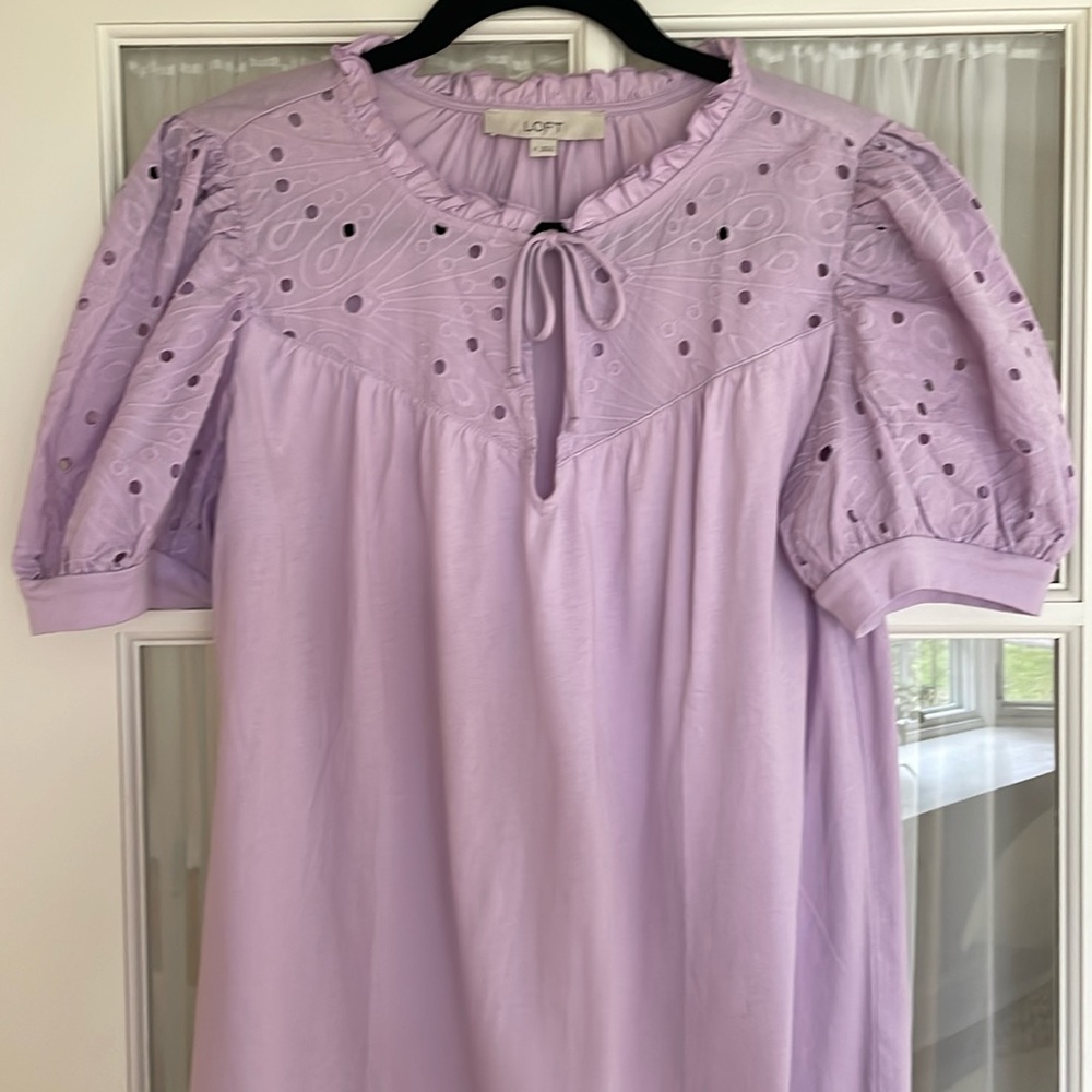Loft top with eyelet sleeves
